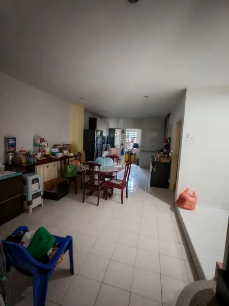 Living features: white painted walls, tile flooring, recessed downlights, dining table with four chairs, kitchen cabinets, stainless-steel fridge, open layout, multiple storage boxes, plastic chairs, kitchen countertop, doorway leading to kitchen, decorative items on countertop.