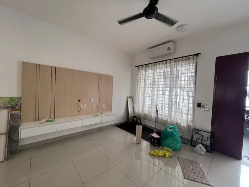 Living features: white painted walls, glossy ceramic tile flooring, 5-blade ceiling fan, large window with sheer curtains, built-in wooden wall unit with storage, dark purple door, air conditioning unit, decorative mirror, green plastic bags, rolled-up carpet, floor mat; style: modern.