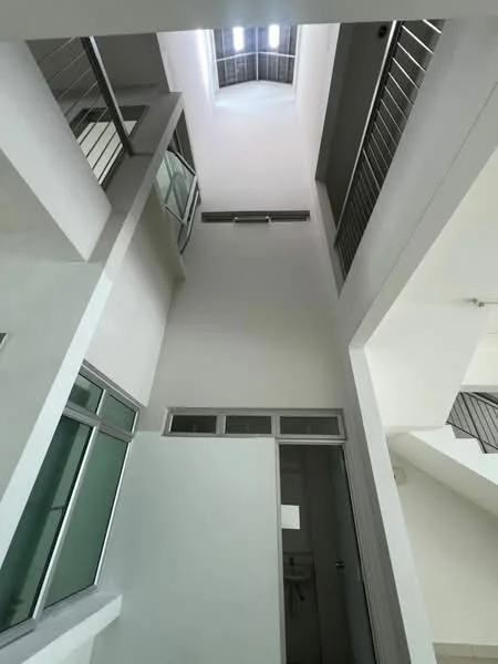 Room features: high ceiling, skylight, white painted walls, glass windows, metal railing, open space, staircase, natural light; style: modern.