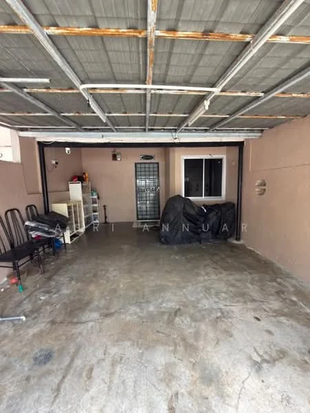 Exterior type: car porch; features: concrete flooring, metal roof with exposed beams, single metal door, window with white frame, storage shelves, two black tarps covering items, wall with beige paint, light fixtures on ceiling; style: modern.