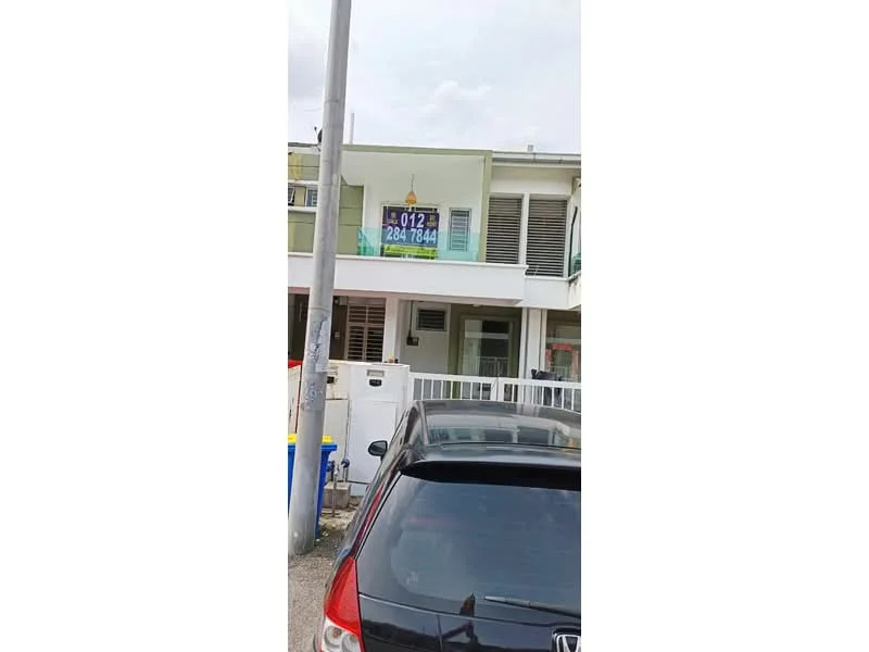 Exterior type: linked terrace house; features: white painted facade, glass balcony railing, front porch with space for parking, manicured lawn, security gate, signboard with contact information, two-storey structure, windows with horizontal slats, concrete driveway; style: modern.