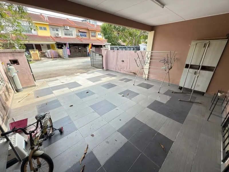 Exterior type: linked terrace house; features: paved flooring with grey and black tiles, open-air parking area, metal gate, clothes drying rack, bicycle, surrounding residential buildings, front yard space; style: modern.