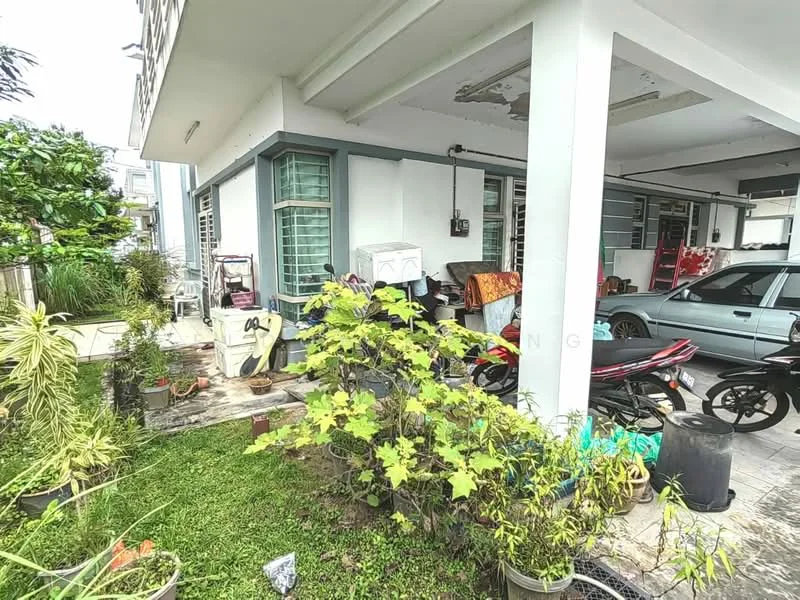 Exterior type: linked terrace house; features: manicured lawn, potted plants, concrete walkway, car parked in driveway, motorcycle parked, covered porch area, windows with grills, exposed concrete columns, outdoor furniture, garden area; style: modern.