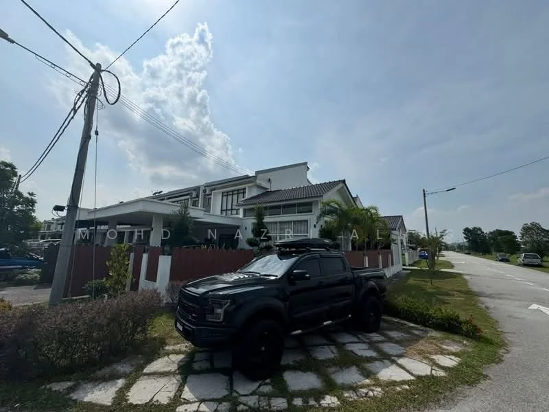 Exterior type: linked terrace house; features: white painted facade, pitched tile roof, manicured lawn, paved walkway, surrounded by greenery, driveway with interlocking pavers, two-storey structure, front porch, visible car parked in driveway; style: modern.
