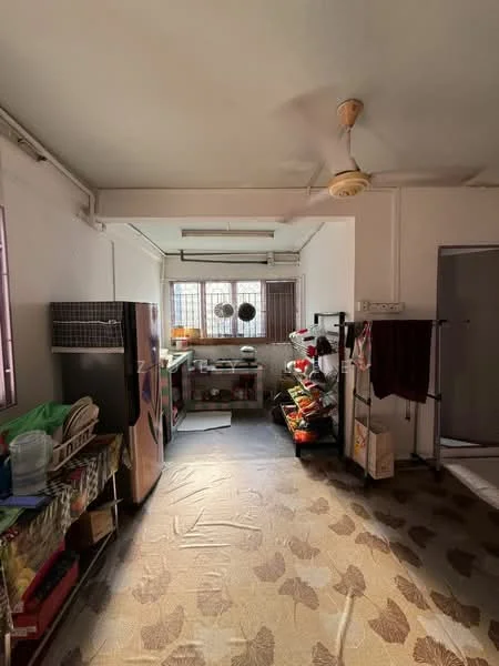 Kitchen features: floor-to-ceiling windows, ceiling fan, stainless-steel fridge, wooden shelving unit, countertop with sink, kitchen cabinets, wall-mounted storage, decorative fruit display, tile flooring with floral pattern, laundry area with drying rack.