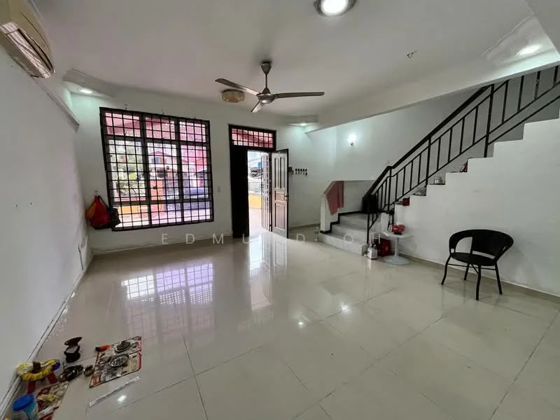 Living features: white painted walls, glossy ceramic tile flooring, 5-blade ceiling fan, recessed downlights, large windows with black frames, open space layout, staircase with metal railing, air conditioning unit, decorative wall clock, black plastic chair, small decorative items on the floor; style: modern.