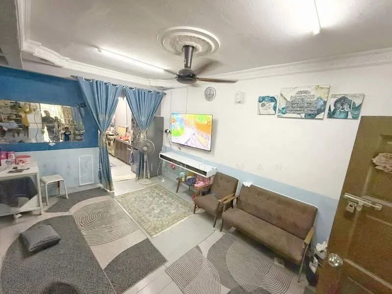 Living features: 3-seater fabric sofa in brown, 2-seater fabric sofa in brown, area rug with circular pattern, wall-mounted TV, ceiling fan, decorative ceiling rose, painted walls in light blue and white, curtains in blue fabric, floor tiles in light grey, wall-mounted mirror, decorative wall art; style: modern.