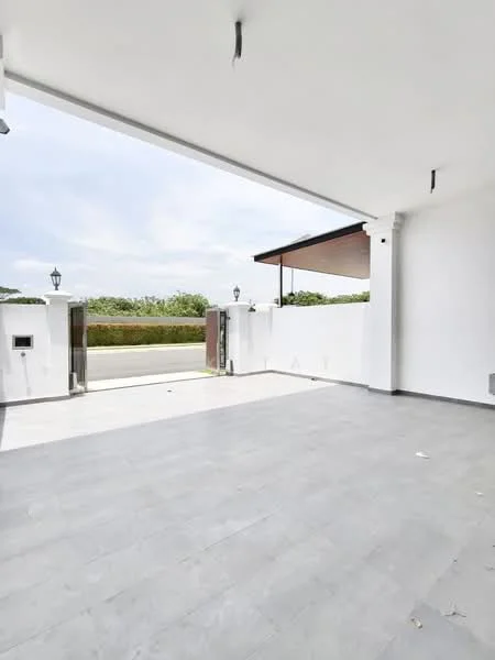 Exterior features: open-air space, grey tiled flooring, white painted walls, overhead ceiling, lampposts, fenced perimeter, landscaped greenery in background; style: modern.