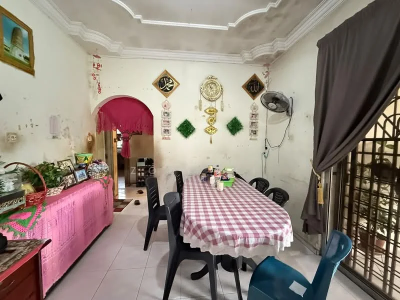 Dining features: checkered tablecloth on dining table, long rectangular dining table, black plastic chairs, white tiled flooring, cream painted walls, decorative wall hangings, wall-mounted ceiling fan, arched doorway, curtains on window, decorative plants on shelves, wall clock, crown moulding on ceiling; style: traditional.