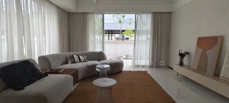 Living features: curved white fabric sofa, round white side table, area rug in beige, white console table, large floor-to-ceiling windows, sheer white curtains, decorative wall paneling, framed artwork on the wall; style: modern; view: garden.