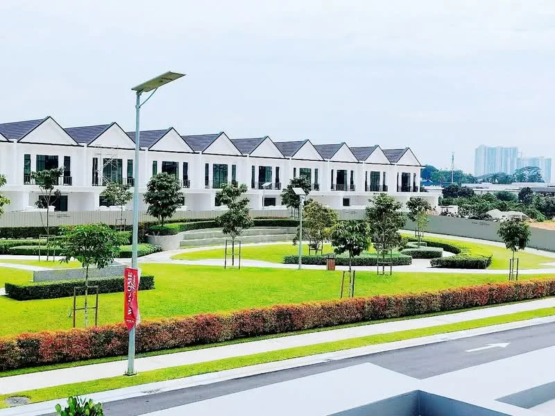 Exterior type: linked terrace house; features: white painted facade, pitched tile roof, manicured lawn, mature trees, landscape garden, paved walkway, street lighting, surrounded by greenery; style: modern.