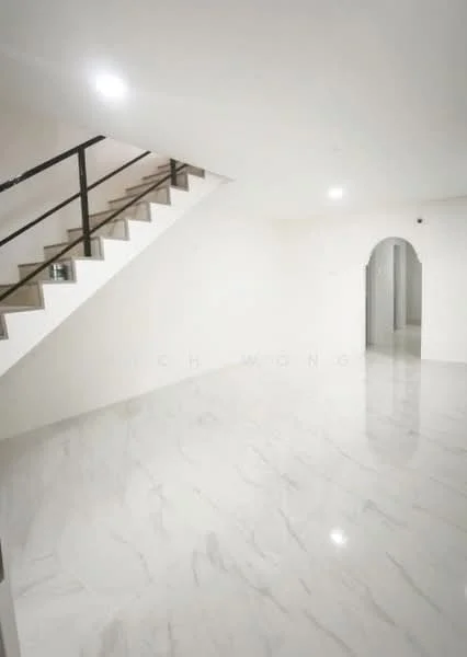 Room features: marble flooring, white painted walls, recessed downlights, staircase with metal railing, arched doorway, open layout, neutral color scheme, no visible furniture; style: modern.