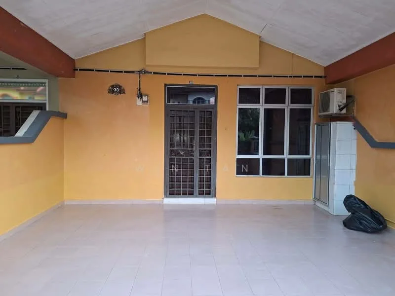Room features: orange painted walls, white tiled flooring, sliding glass door, window with grid pattern, exposed beams on ceiling, wall-mounted air conditioning unit, open space layout, door with security grille.