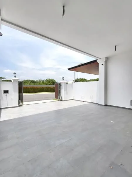Exterior features: grey tiled flooring, white painted walls, overhead lighting fixtures, open space, landscaped area visible in background, gated entry, two wall-mounted lamps, flat roof overhang; style: modern.