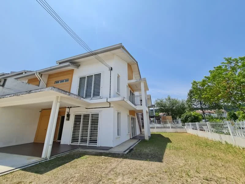 Exterior type: semi-detached house; features: white painted facade, wooden accents, flat roof, two-storey structure, ground floor patio, metal railing on staircase, manicured lawn, surrounded by greenery, fenced perimeter, driveway, large windows with shutters; style: modern.