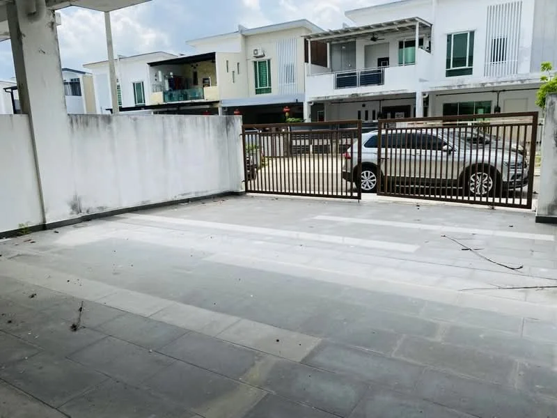 Exterior type: linked terrace house; features: paved driveway, metal gate, white painted walls, two-storey houses in background, greenery visible, car parked in driveway; style: modern.