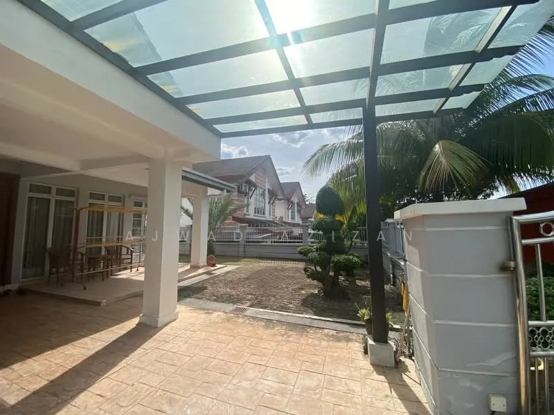 Exterior type: detached bungalow; features: covered patio with glass roof, paved walkway, manicured garden, mature palm trees, landscaped shrubs, fenced perimeter, two-storey house visible in background, sunny outdoor space; style: modern.