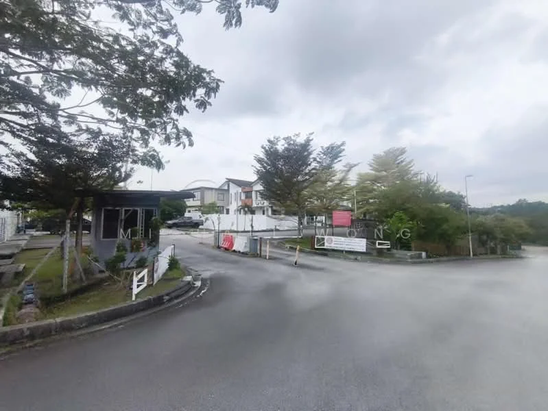 Exterior type: gated community; features: guard house at entrance, manicured landscaping, paved road, street lighting, surrounded by greenery, signage for community, security barriers; style: modern.
