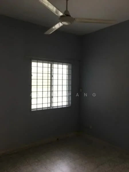 Room features: light blue painted walls, ceiling fan, window with security grille, tile flooring, corner electrical outlet.