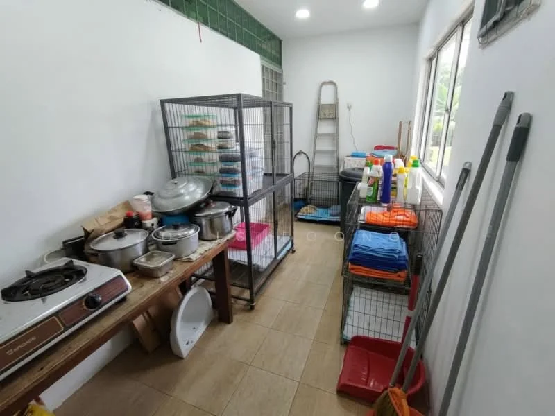 Laundry features: white painted walls, tile flooring, single-basin sink, wooden table, gas stove, metal shelving unit, plastic storage bins, cleaning supplies, laundry baskets.