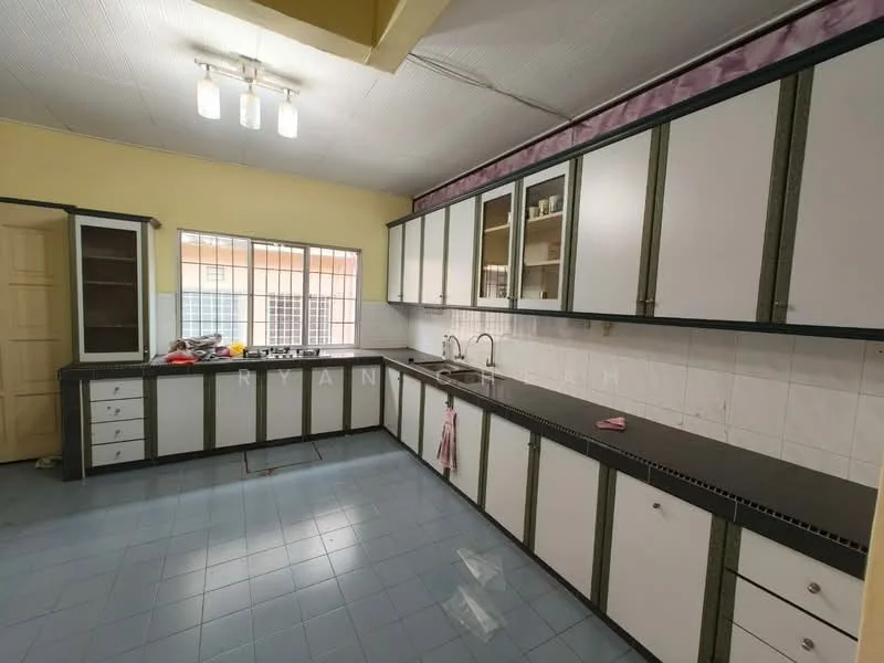 Kitchen features: white cabinets with black trim, black countertop, ceramic tile backsplash, double-basin stainless-steel sink, window above sink, overhead fluorescent lighting, blue ceramic tile flooring, built-in cabinets, open shelving, kitchen utensils on countertop.
