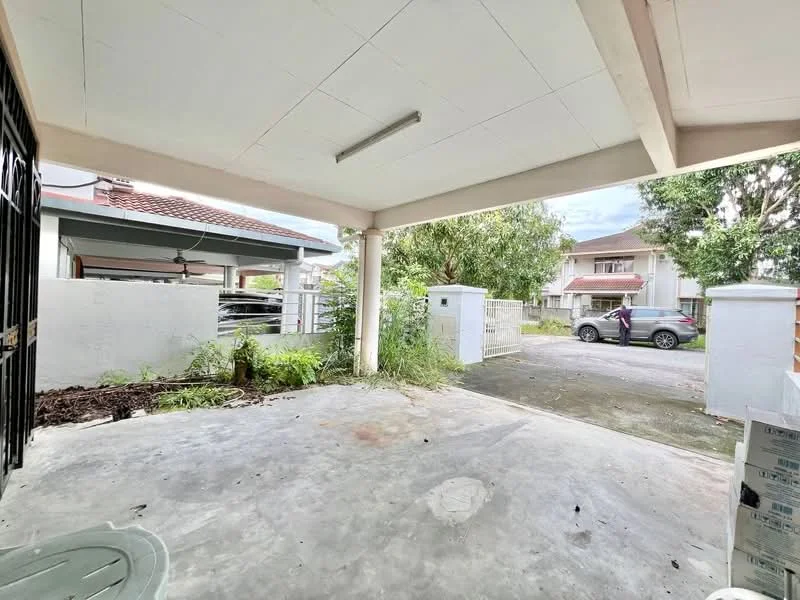 Exterior type: semi-detached house; features: concrete flooring, covered car porch, manicured lawn, surrounded by greenery, white painted walls, gate at entrance, driveway, street view; style: modern.