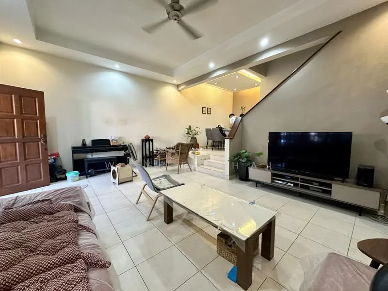 Living features: cream painted walls, white ceiling with recessed lighting, 5-blade ceiling fan, large flat-screen TV on media console, light-colored tiled flooring, coffee table, sofa with patterned upholstery, potted plants, staircase leading to upper level, piano, decorative wall art; style: contemporary.