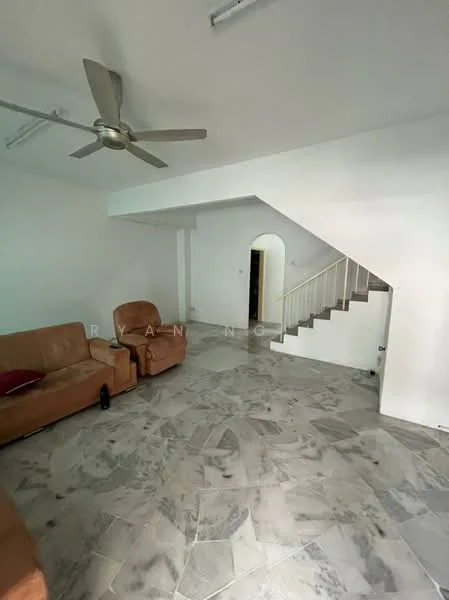 Living features: 3-seater fabric sofa in brown, 2-seater fabric sofa in brown, marble flooring, white painted walls, 5-blade ceiling fan, staircase with white railing, doorway leading to hallway, natural light from windows; style: modern.