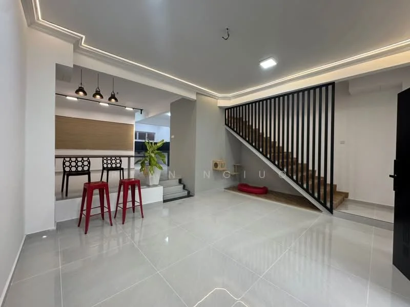 Living features: white painted walls, grey ceiling with recessed lighting, polished ceramic tile flooring, staircase with wooden steps and black railing, open layout to dining area, pendant lighting above bar area, two red bar stools, green potted plant, red pet bed, wall-mounted TV space, decorative wall paneling; style: modern.