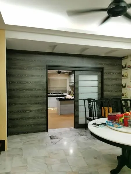 Dining features: round dining table, black wooden dining chairs, marble flooring, decorative wall with wallpaper, ceiling fan, wall with wood paneling, open doorway to kitchen, light-colored walls; style: modern. Room features: kitchen visible through doorway, light-colored cabinetry, kitchen countertop, appliances visible in kitchen.