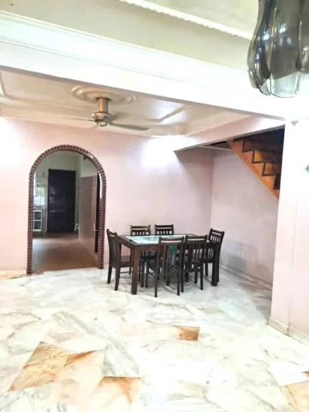 Dining features: marble flooring, pink painted walls, tray ceiling, 5-blade ceiling fan, dining table with six chairs, arched doorway, staircase leading to upper floor, wall with exposed brick detail; style: modern.