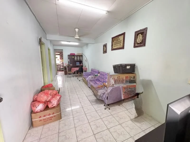 Room features: white painted walls, ceramic tile flooring, 5-blade ceiling fan, sofa with purple upholstery, storage boxes, decorative wall art, open layout, natural light from windows.