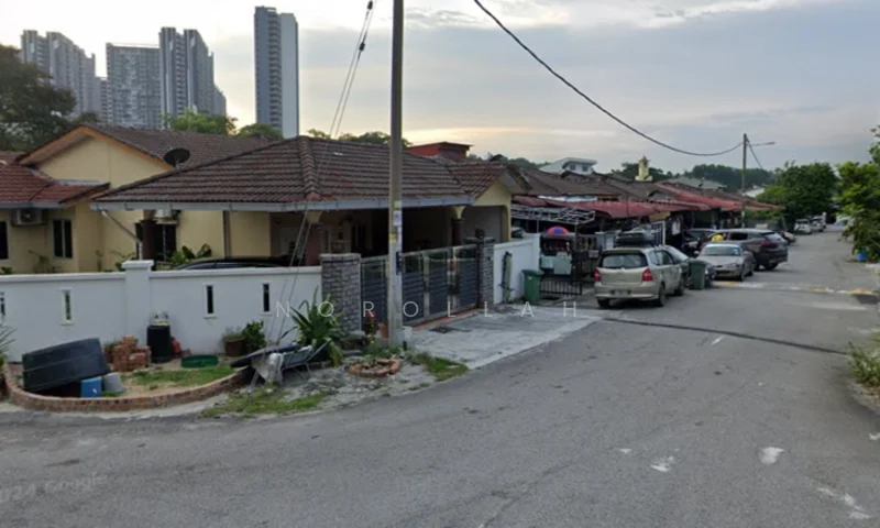 Exterior type: linked terrace house; features: single-storey houses, red tiled roof, white painted facade, front garden with plants, driveway with parked cars, street view with power lines, surrounded by greenery, near high-rise buildings; style: traditional.