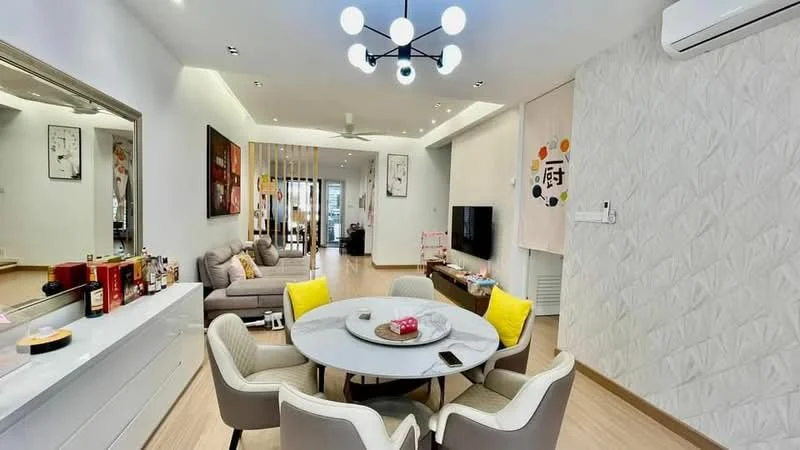 Living features: light wood flooring, white painted walls, ceiling fan with light, chandelier with multiple bulbs, large windows with sheer curtains, sofa in grey fabric, coffee table, wall-mounted TV, decorative wall art, area rug, dining table with round top, upholstered dining chairs in cream, sideboard with storage, decorative items on sideboard; style: modern.