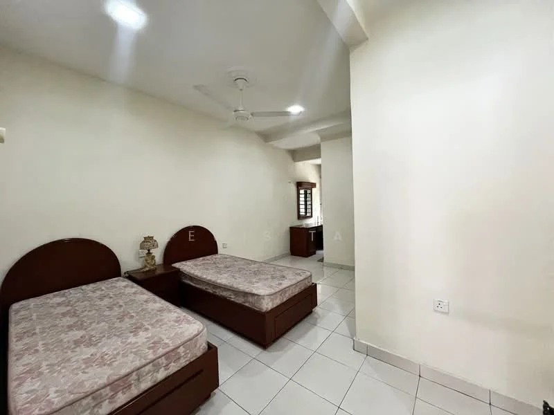 Bedroom features: two single beds with floral-patterned mattresses, wooden bed frames, ceiling fan, white painted walls, tiled flooring, window with natural light, built-in wardrobe, nightstand with decorative item.
