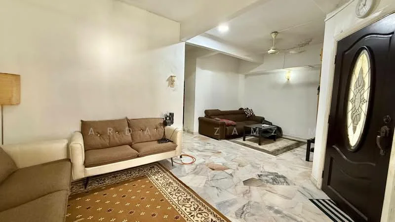 Living features: 3-seater fabric sofa in beige, 2-seater fabric sofa in brown, marble flooring, ceiling fan, decorative area rug with geometric pattern, wall-mounted light fixture, wooden front door with glass insert, coffee table, wall with white painted finish, corner lamp, open layout to adjacent room; style: traditional.