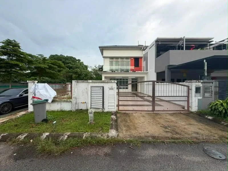 Exterior type: detached bungalow; features: white painted facade, two-storey structure, gated entrance, driveway with interlocking pavers, manicured lawn, surrounded by greenery, large windows, balcony on upper floor, car porch, visible parking area; style: modern.