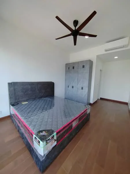Bedroom features: king-size bed, upholstered headboard, ceiling fan, wooden flooring, built-in wardrobe with grey finish, wall-mounted split AC, white painted walls, natural light from window; style: modern.