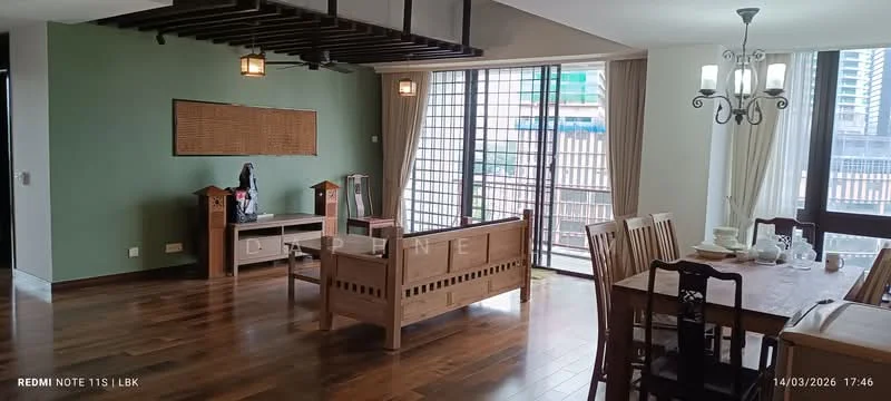 Living features: wooden flooring, green painted accent wall, large sliding glass door, floor-to-ceiling windows, dining table with chairs, wooden sideboard, decorative wall art, chandelier with multiple lights, sofa, curtains, open layout, recessed ceiling with beams; style: modern; view: city.