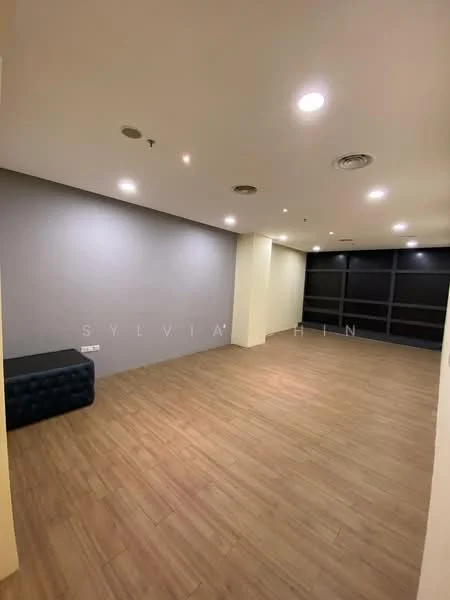 Room features: light wood laminate flooring, grey accent wall, white painted walls, recessed downlights, wall-mounted shelving, open space layout; style: modern.