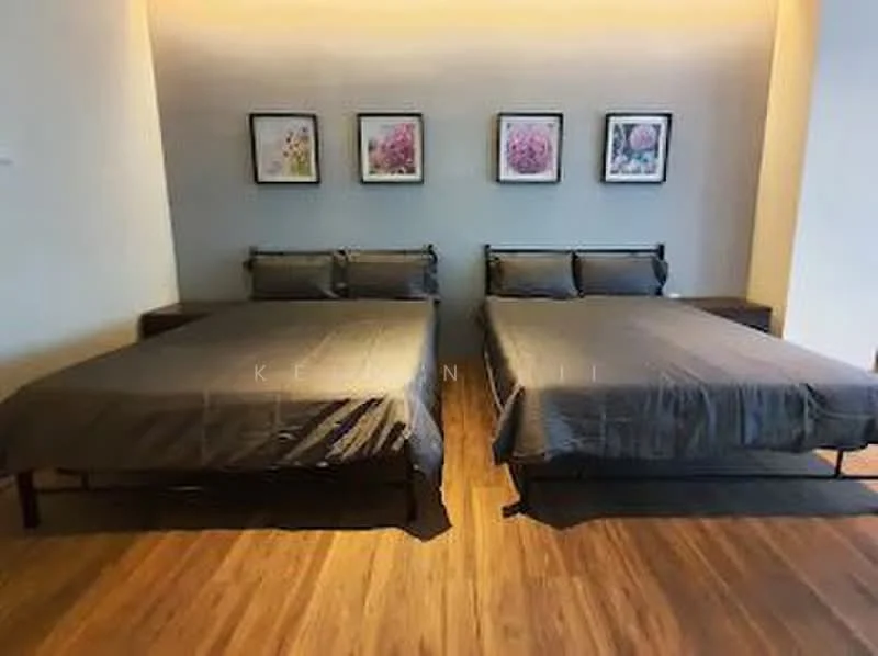 Bedroom features: two queen-size beds with grey bedding, wooden flooring, wall-mounted artwork with floral prints, nightstands on either side of the beds, soft ambient lighting above the beds, neutral wall color, no visible windows; style: modern.