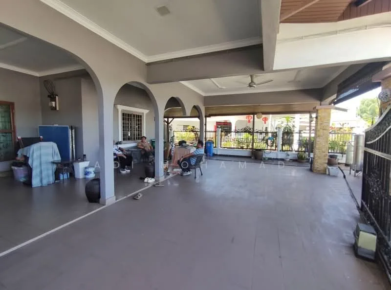Room features: grey tiled flooring, exposed beams on ceiling, ceiling fan, arched doorways, large windows, outdoor seating area, furniture including chairs and tables, decorative pots, open layout; style: modern; view: garden.