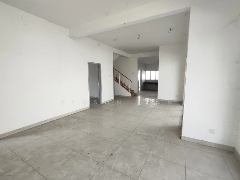 Room features: white painted walls, grey tiled flooring, staircase visible in background, large windows for natural light, open layout, no visible furniture, unfinished walls, ceiling lights.