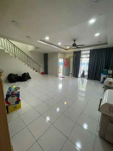 Living features: white painted walls, glossy white tile flooring, tray ceiling with recessed lighting, 5-blade ceiling fan with light, large sliding glass door, floor-to-ceiling windows with sheer curtains, open layout, staircase with metal railing, decorative wall with red banners, area rug, two large black bean bags, built-in cabinetry, natural light from windows; style: modern.
