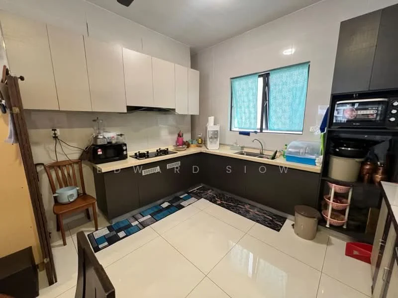 Kitchen features: L-shaped kitchen layout, white laminate upper cabinets, dark grey lower cabinets, stainless-steel sink, chrome pull-down faucet, built-in oven, microwave, 4-burner gas hob, black countertop, white tiled backsplash, ceramic tile flooring, window with green curtain, area rug with geometric pattern, wooden dining chair, plastic waste bin; style: modern.