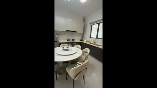 Kitchen features: white cabinetry, dark wood lower cabinets, marble countertop, round dining table, 4 upholstered dining chairs, stainless-steel fridge, built-in oven, ceramic tile flooring, window with blinds, recessed lighting, kitchen utensils on countertop, sink, wall-mounted cabinets; style: modern.