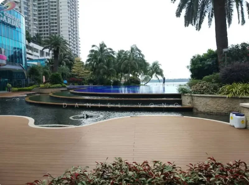 Exterior type: landscape garden; features: infinity pool, manicured landscaping, palm trees, water feature, wooden deck, surrounding greenery, modern architecture, waterfront view; style: modern.