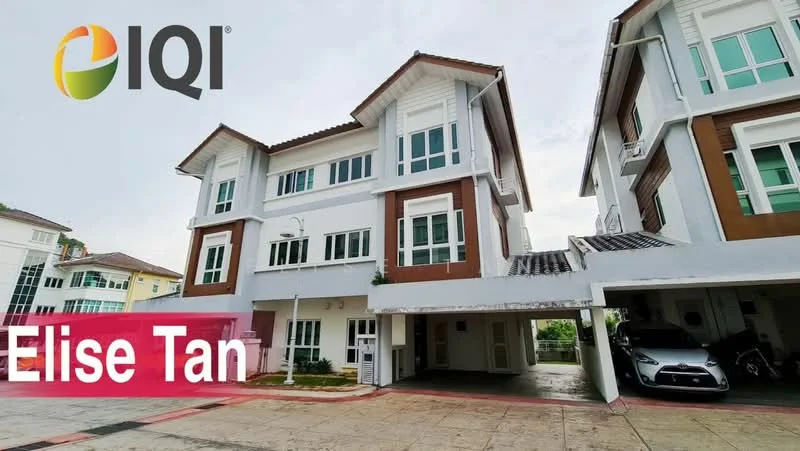 Exterior type: linked terrace house; features: white painted facade, brown wooden accents, multiple storeys, covered car porch, driveway with interlocking pavers, balconies on upper floors, large windows, manicured landscaping; style: modern.