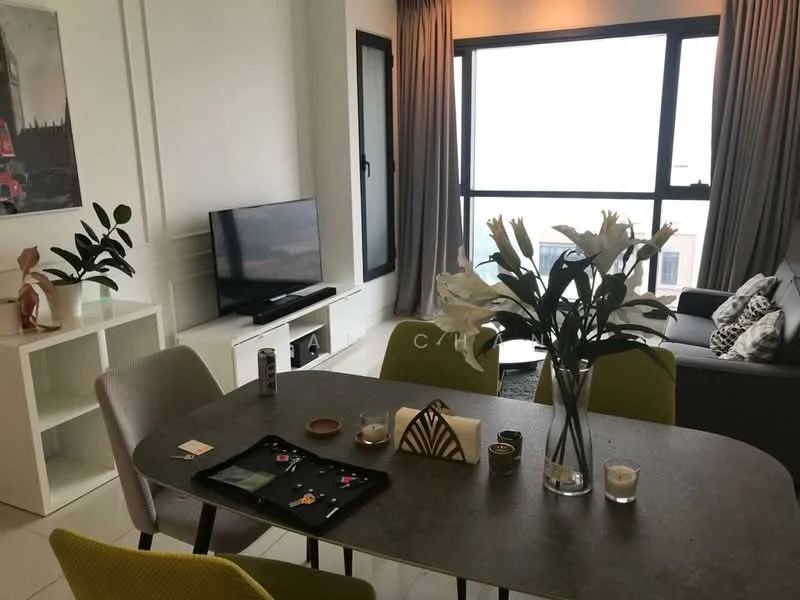 Dining features: dining table with grey surface, 4 green upholstered dining chairs, decorative centerpiece with flowers, candles on the table, small decorative items on the table, wall-mounted TV, floor-to-ceiling windows, curtains in light grey, light-colored tiled flooring, sofa in grey fabric, decorative cushions on sofa, white shelving unit, artwork on the wall; style: modern; view: city.