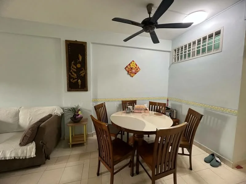 Dining features: round dining table, 6 wooden dining chairs, white tablecloth, light blue painted walls, ceiling fan with 5 blades, decorative wall art, window with grille, tiled flooring, sofa in beige fabric, houseplant in ceramic pot; style: traditional.